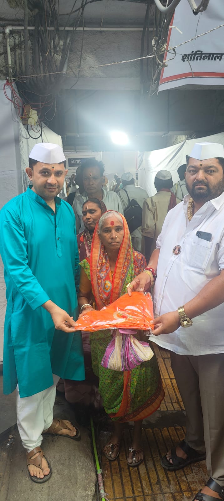 Serving devotees on the sacred Palkhi pilgrimage — distributing free water, refreshments, free eye check-ups and care to the warkaris on their long walk to Pandharpur.